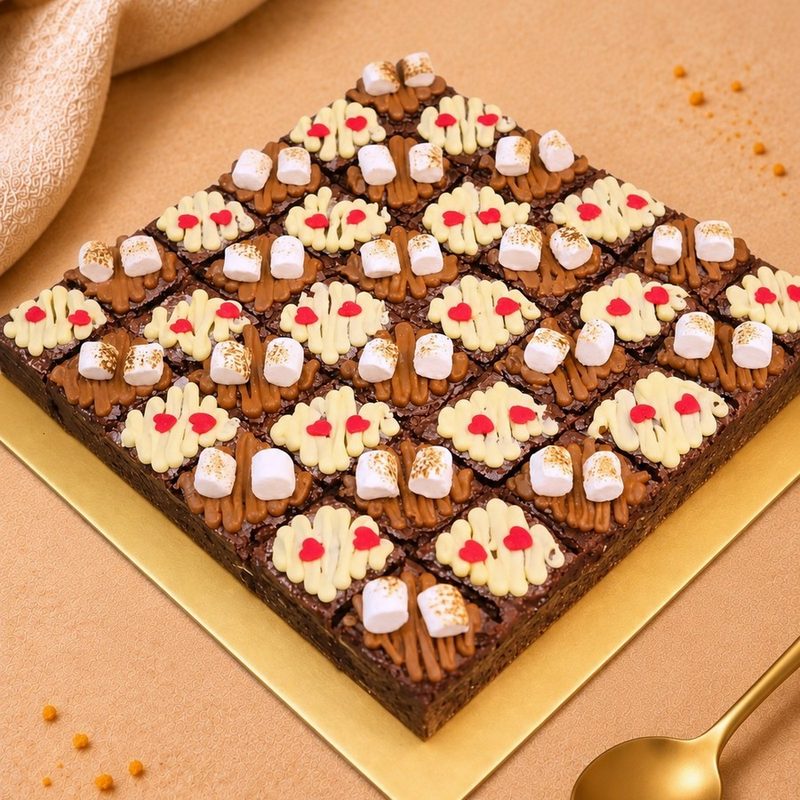Tray of KRYM Delights brownies decorated with marshmallows and sprinkles, cut into squares